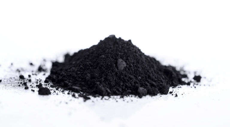 activated charcoal isolated on white background supporting chemical sourcing UK